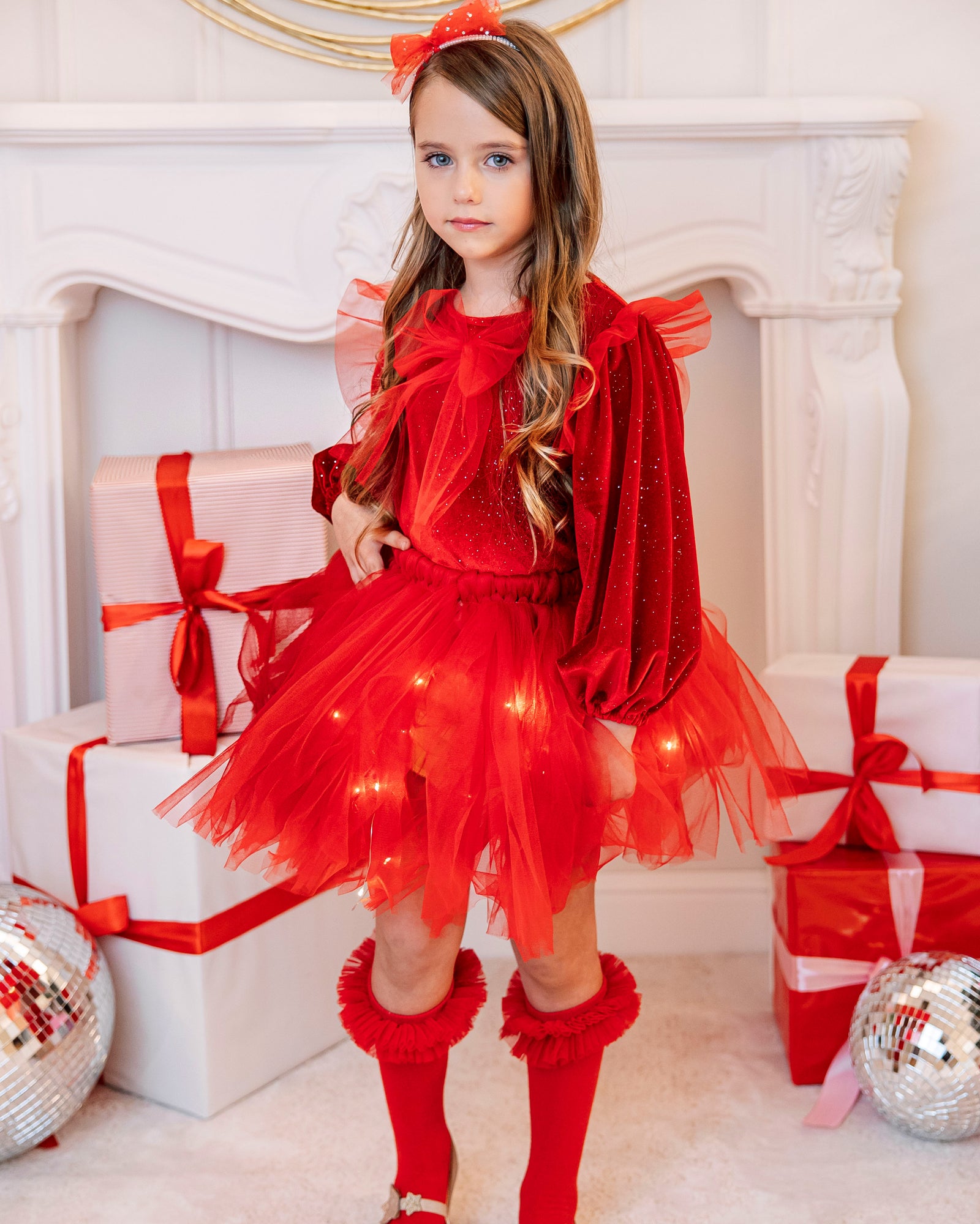 Fustița cu Luminițe, Roșie