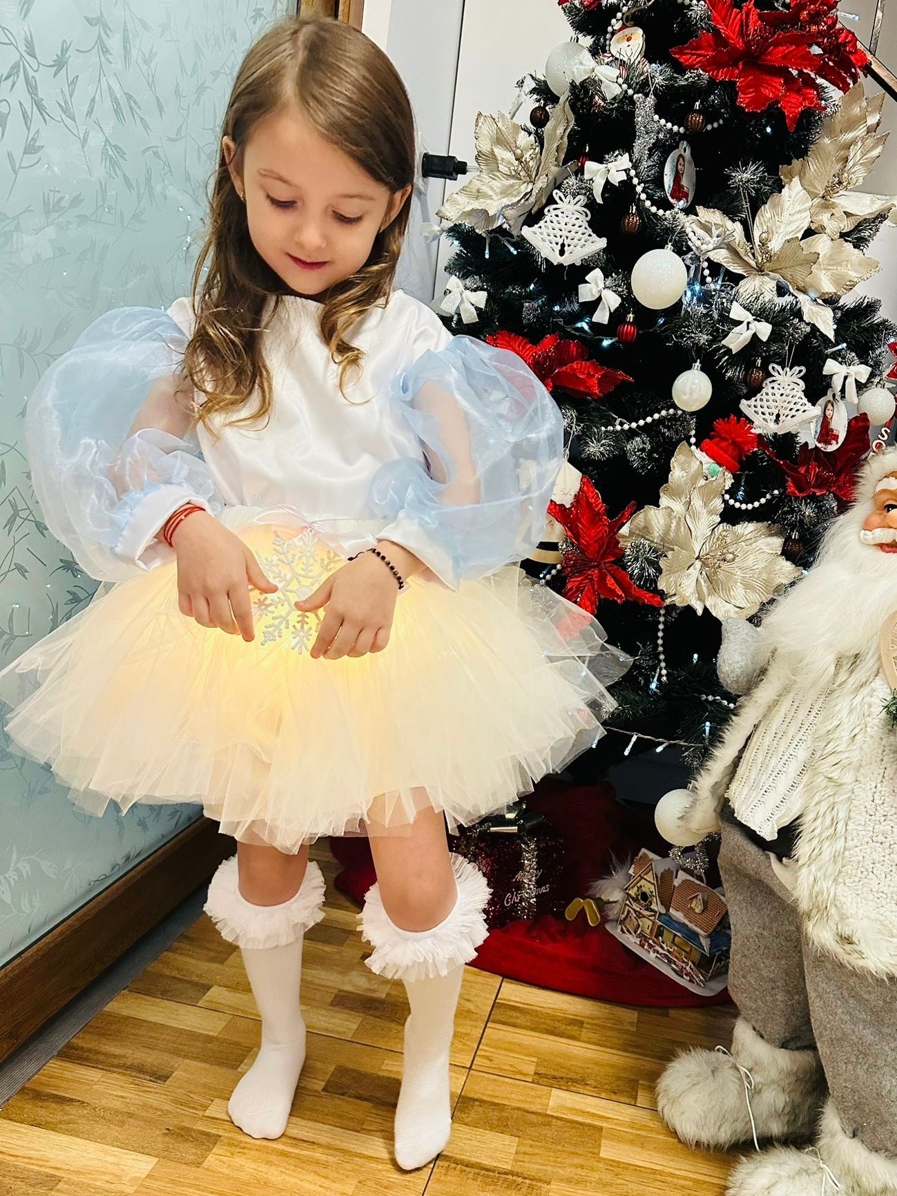 Fustița cu Luminițe, Fulg de Nea