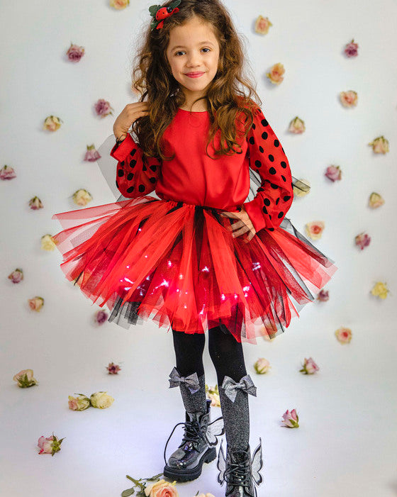 Fustița cu Luminițe, Buburuză pentru Serbare